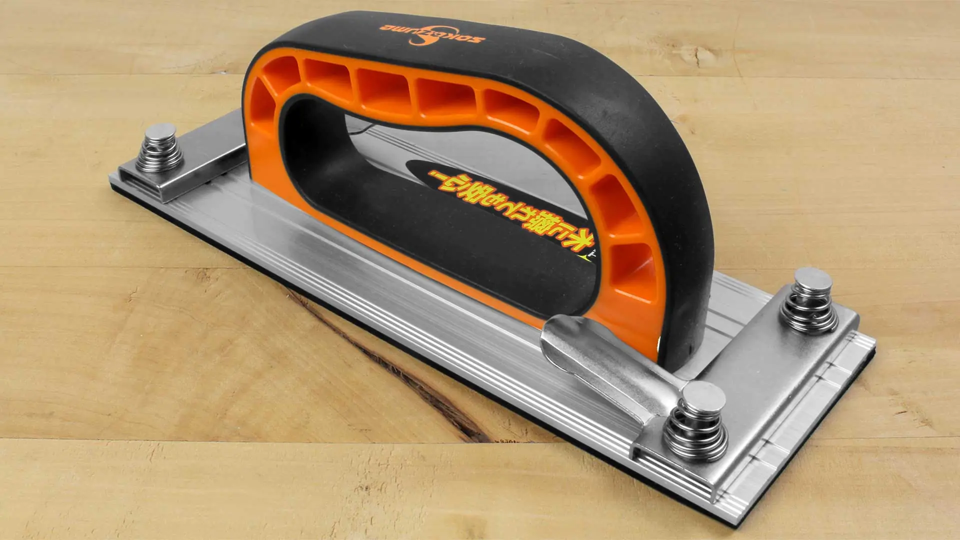 Hand sander with dual-component handle and foam rubber pad