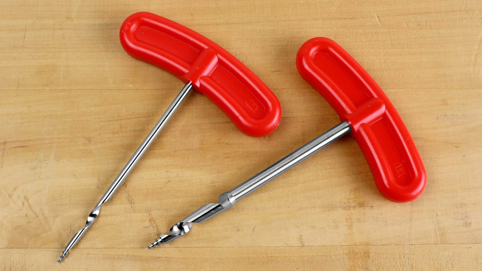 Hand drill with plastic handle