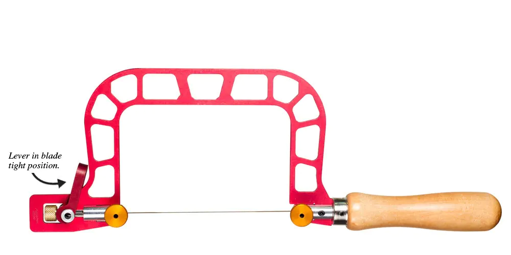 Fret saw blade tension using lever