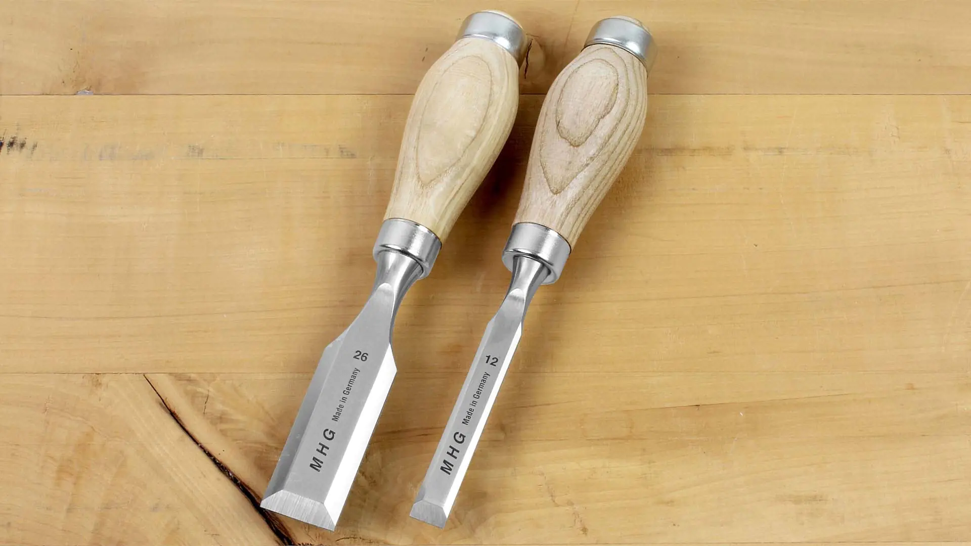 Relatively short chisels with an oiled ash handle Relatively short chisels with an oiled ash handle
